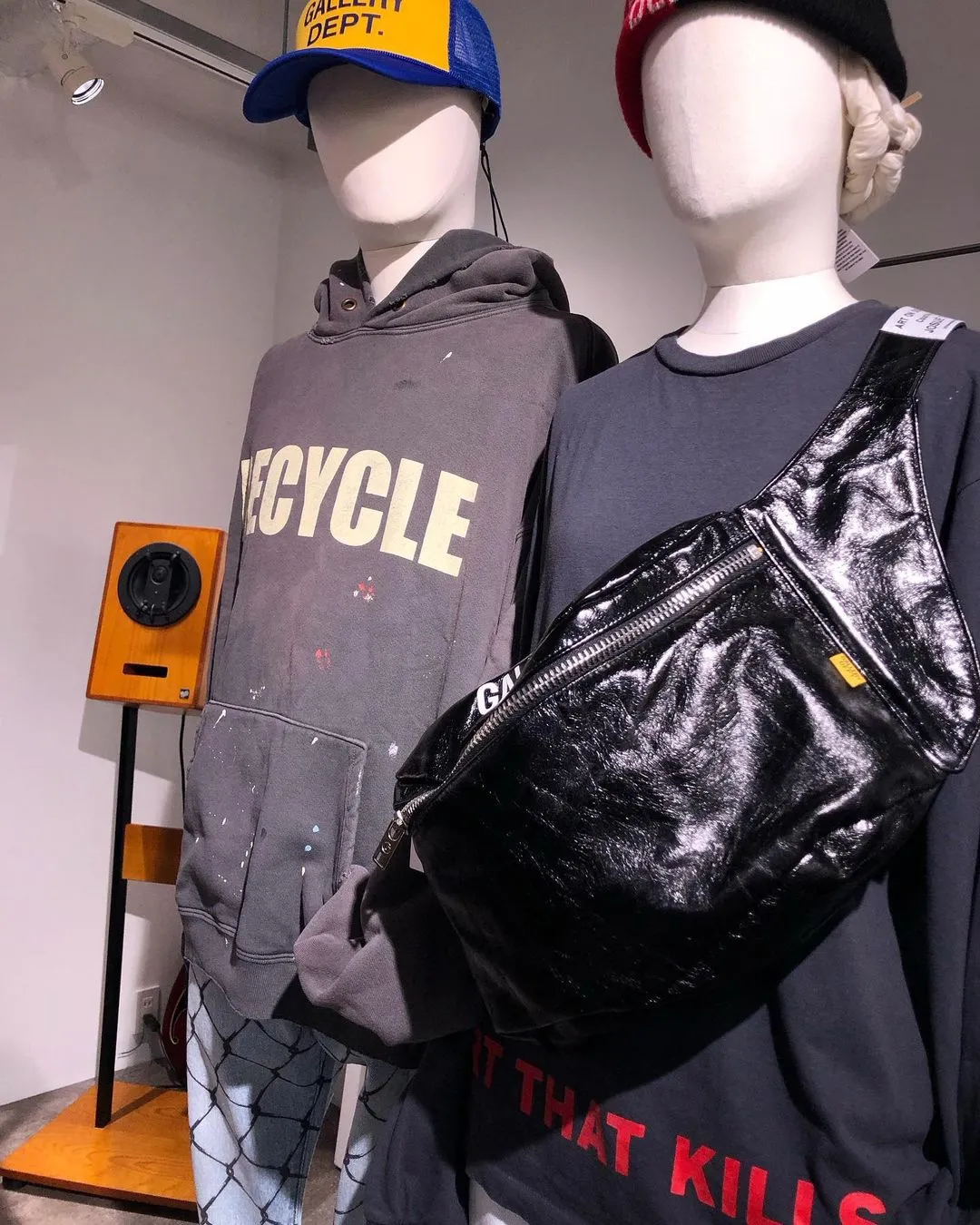 GALLERY DEPT. 90'S RECYCLE HOODIE WASHED BLACK 90'S washed hoodie with distressed eco-friendly slogans. Washed black S-XL. Ready-made garments are washed and dyed again. Multiple spots throughout the body are spray-faded. The ribs are cut and worn.